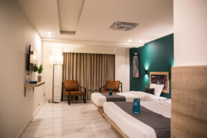 As you gracefully enter the room, experience the enchanting sensation of stepping into a realm of lavish indulgence and supreme comfort. Let the opulence embrace you, immerse yourself in unparalleled luxury, and revel in the exquisite surroundings that redefine the meaning of comfort. This space is not just accommodation; it's a haven where luxury and comfort intertwine seamlessly, promising an unforgettable retreat.