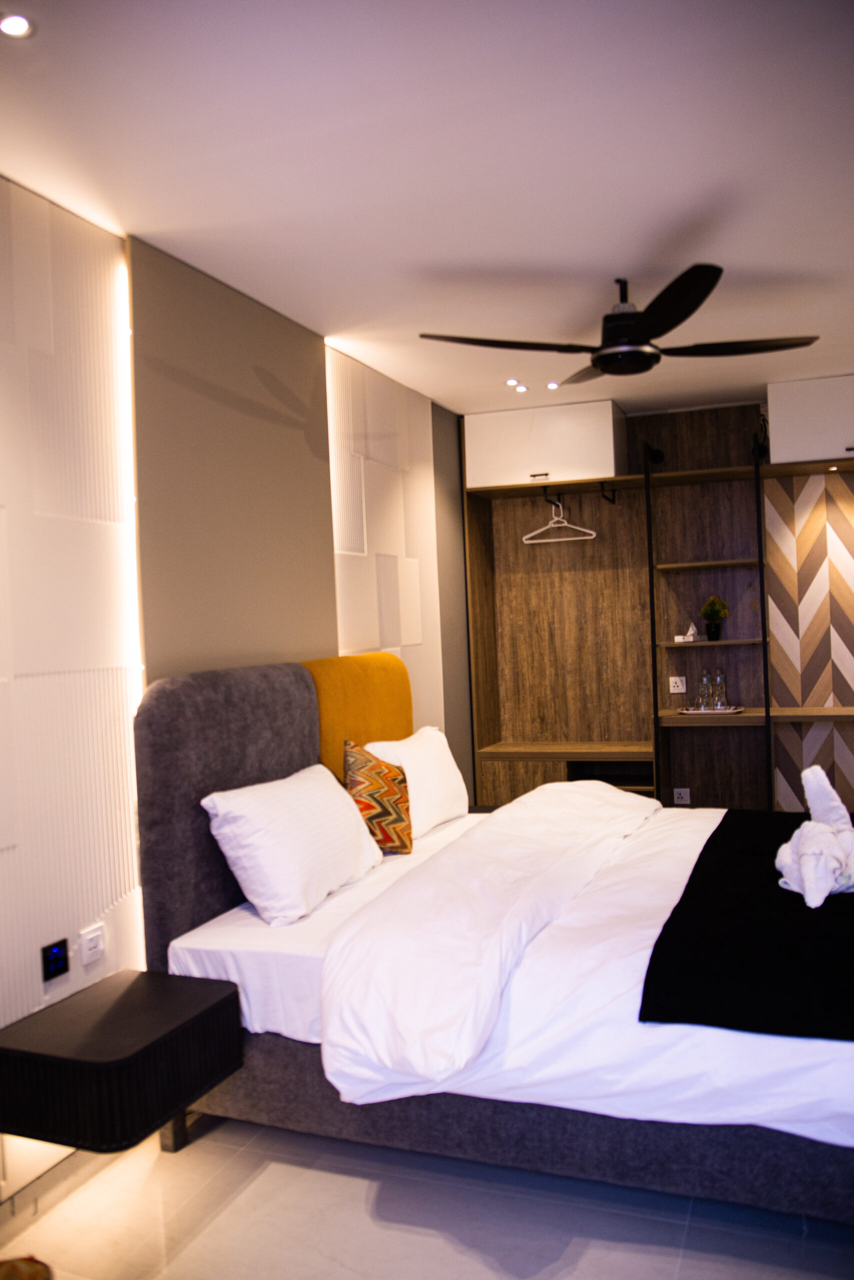 Bedding, wardrobe and contemporary interiors at Hotel Metropole